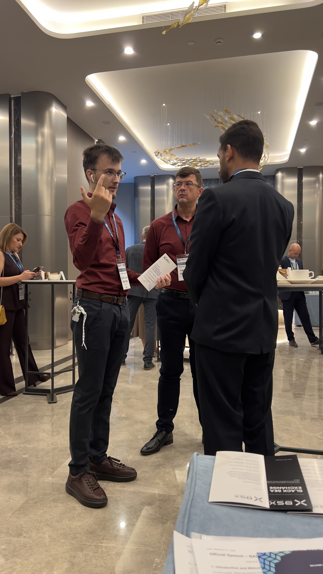 BSX representatives speaking with an event attendee.